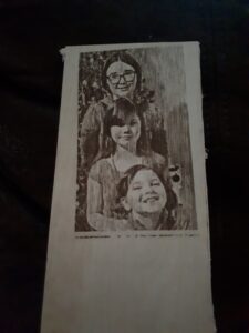 Photo lasered onto wood-vertical grain