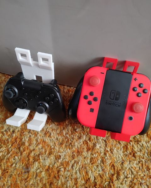 3d printed game controller wall mount with controllers